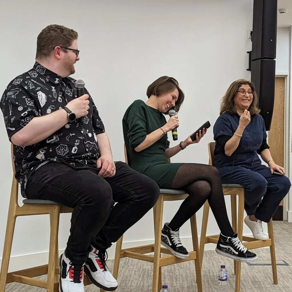 Jack Chambers-Ward, Sarah McDowell, and Tazmin Suleman hosting a live podcast.