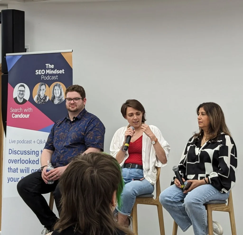 Jack Chambers-Ward, Sarah McDowell, and Tazmin Suleman hosting a live podcast during brightonSEO