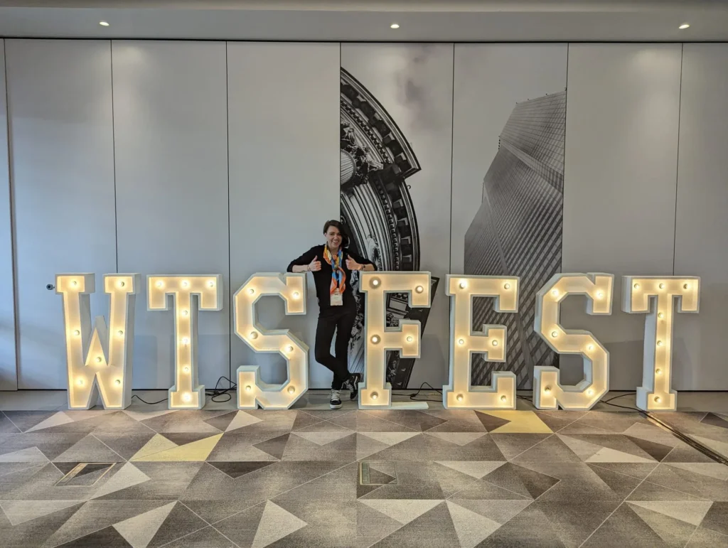 Sarah McDowell posing when working at a volunteer during WTSFest